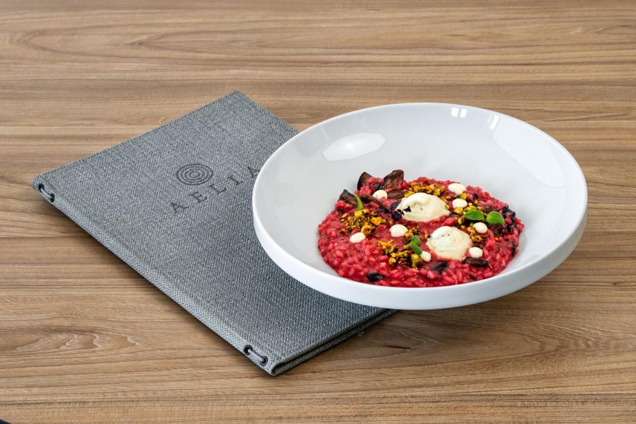Aelia Luxury Suites Karterados  Zewnętrze zdjęcie A risotto prepared at the restaurant